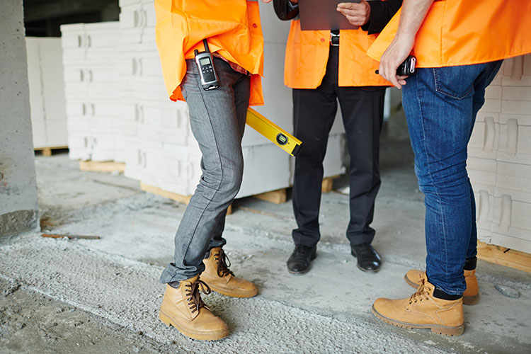 workers inspecting building site