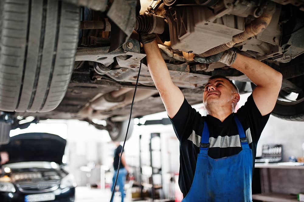 car mechanic in workwear uniform