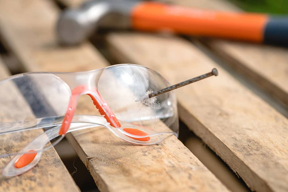 safety glasses with nail accident