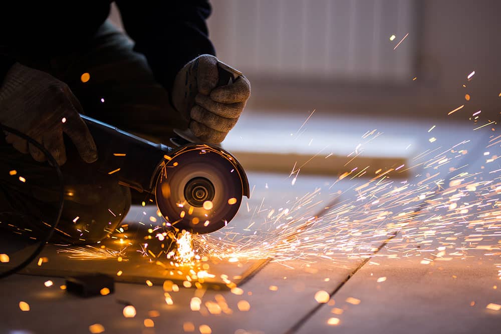 steel worker grinder sparks