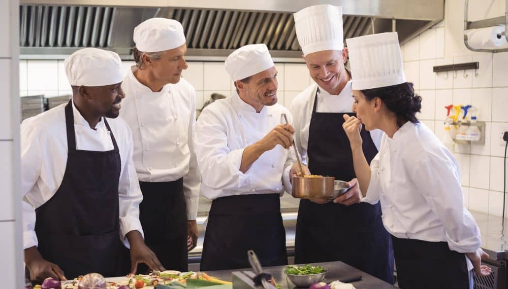 Chefs wearing their uniform.