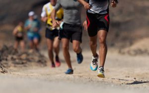 Group of men running.